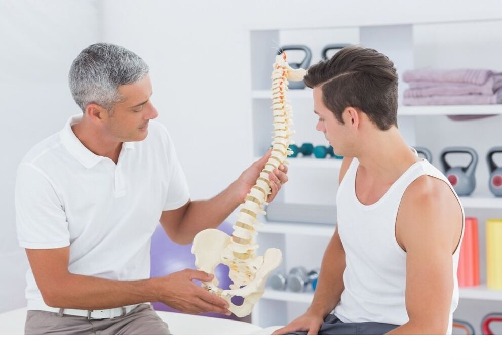 The doctor shows the patient's spinal arterry